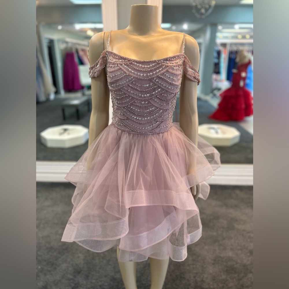 Sizes available 14 and 12.Both dresses are not included in the price. lightmauve